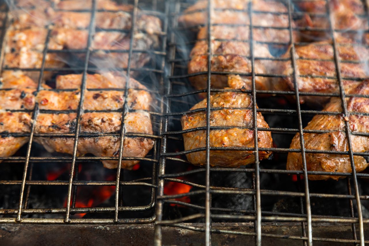 Peppered asun, grilled goat meat with chillies